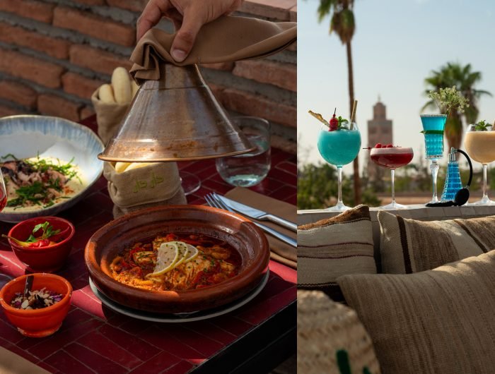 Rooftop restaurant with alcohol in Marrakech Medina with panoramic views of Koutoubia Mosque and Atlas Mountains at sunset