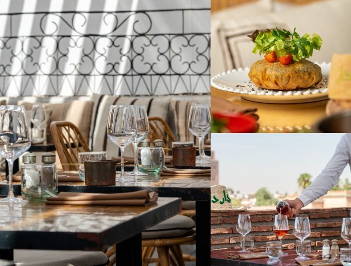Panoramic rooftop restaurant in Marrakech Medina with views of Koutoubia Mosque and Atlas Mountains at sunset